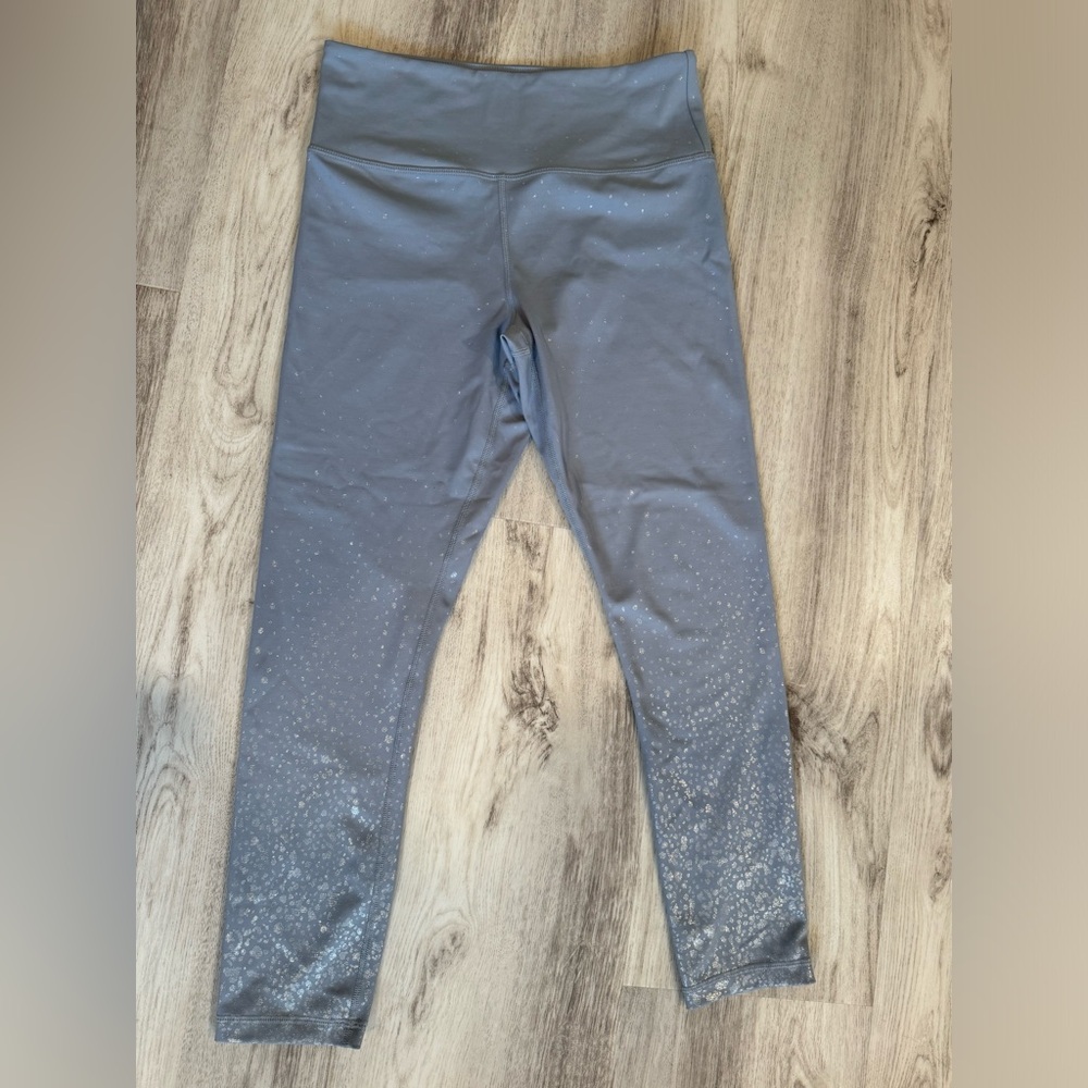 Zyia grey light n tight leggings with silver glitter spots. 7/8 length. Size 6-8